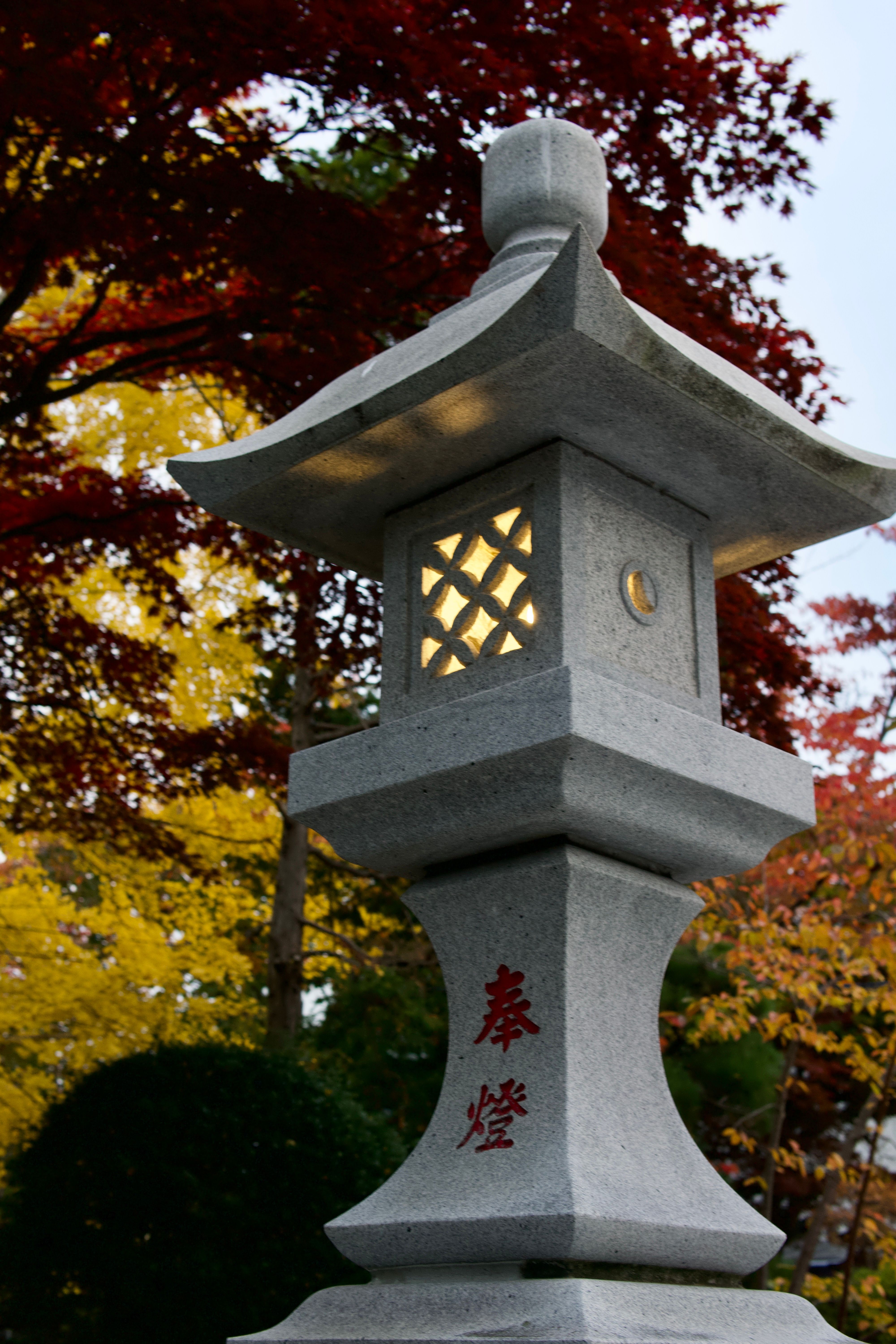 Terracotta stone lamp with lattice openings